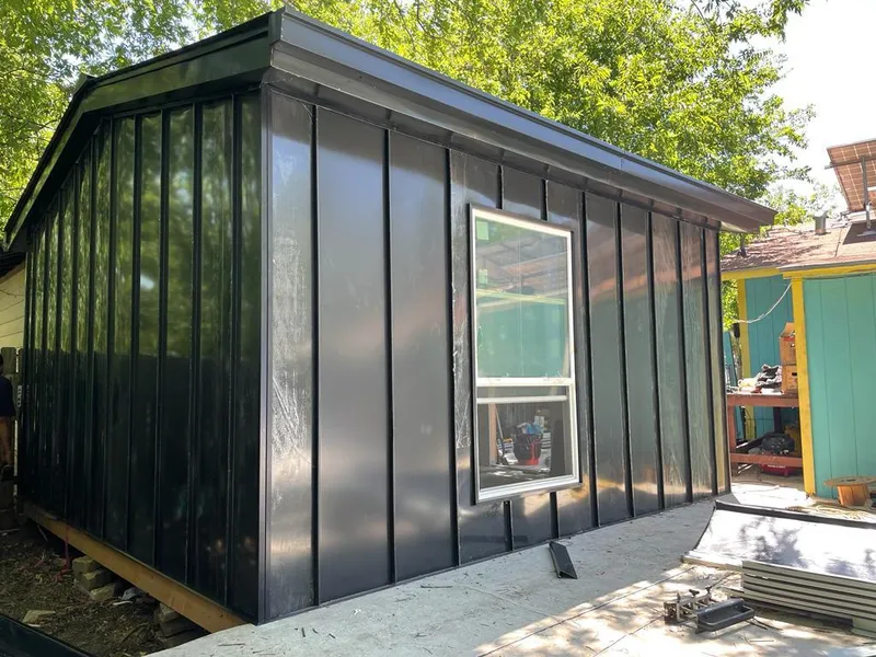 Black standing seam metal wall panels for Roof Inspection in Ponca City