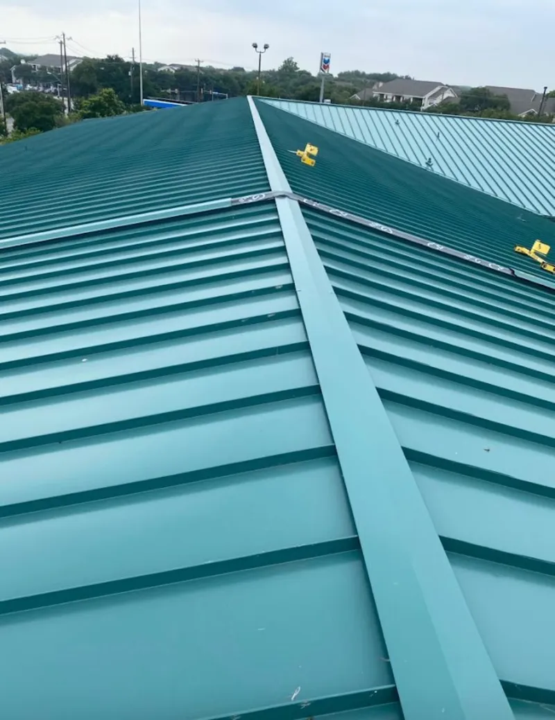 Green commercial metal roof ridge and valley for Metal Roof Repair in Ponca City