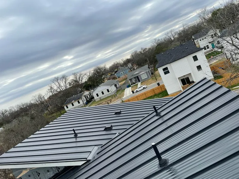 Standing seam metal roof panels with vents for Skylight Repair in Ponca City